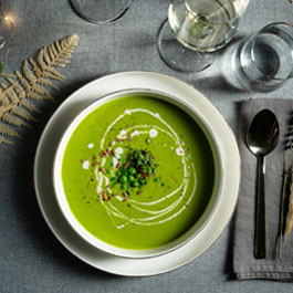 Vegan pea soup with saffron and roasted sunflower seeds