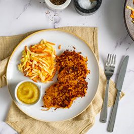 Sweet potato hash browns with carrot-apple salad and apple puree