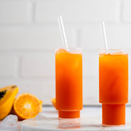 Energising carrot, orange and papaya juice