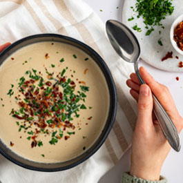 Mushroom cream soup with bacon crumble