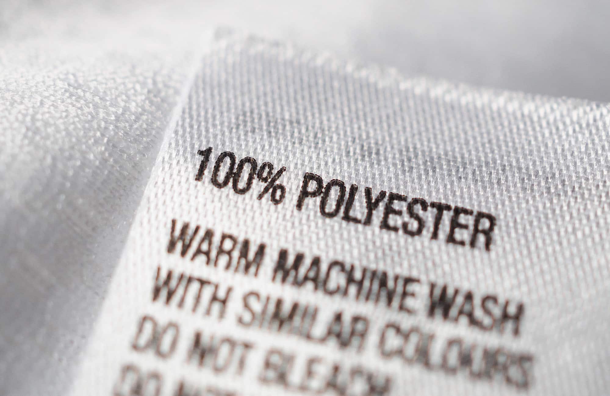 Metka z instrukcją prania materiału 100% poliester