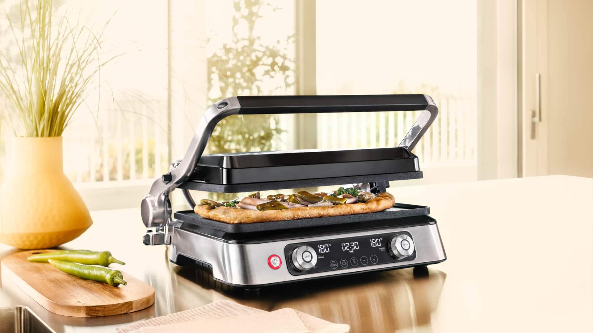 Braun MultiGrill 9 on a table with panini
